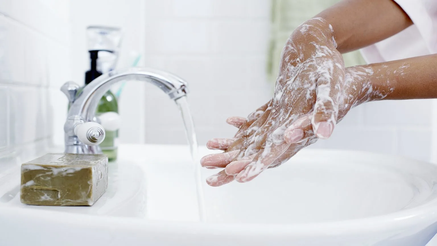 Image: Getty Images person washing hands