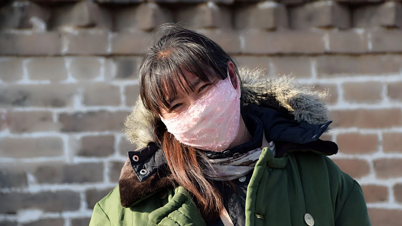 Image: Getty Images woman wearing cloth mask