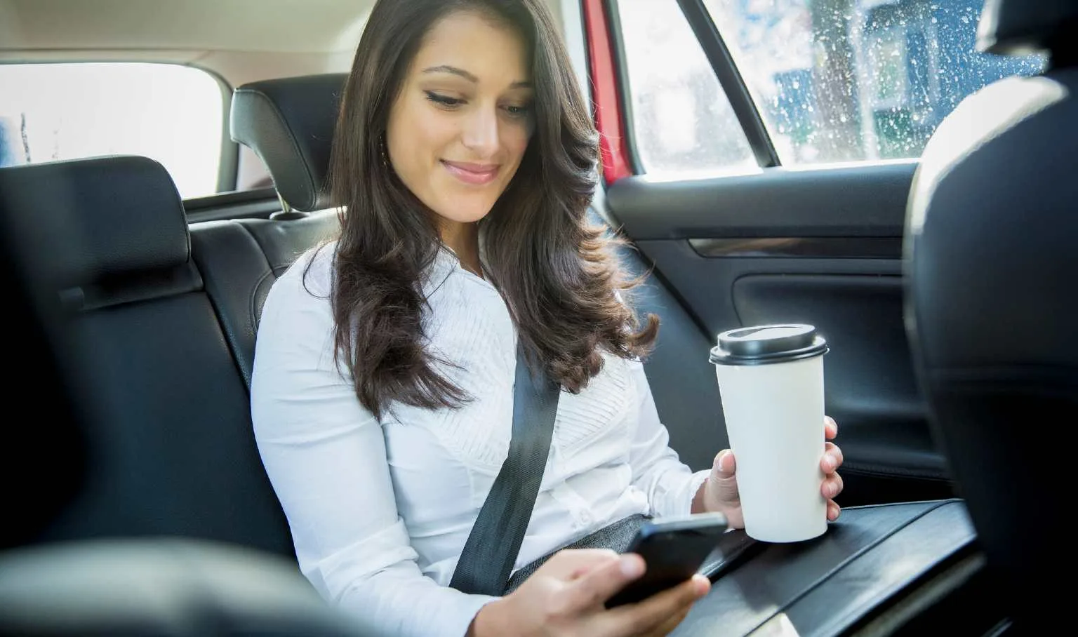 Image: Getty Images Woman using a smartphone