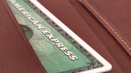 American Express to lower fees for processing card payments