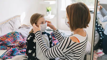 Coronavirus: More than 100 doctors call for face mask use in public