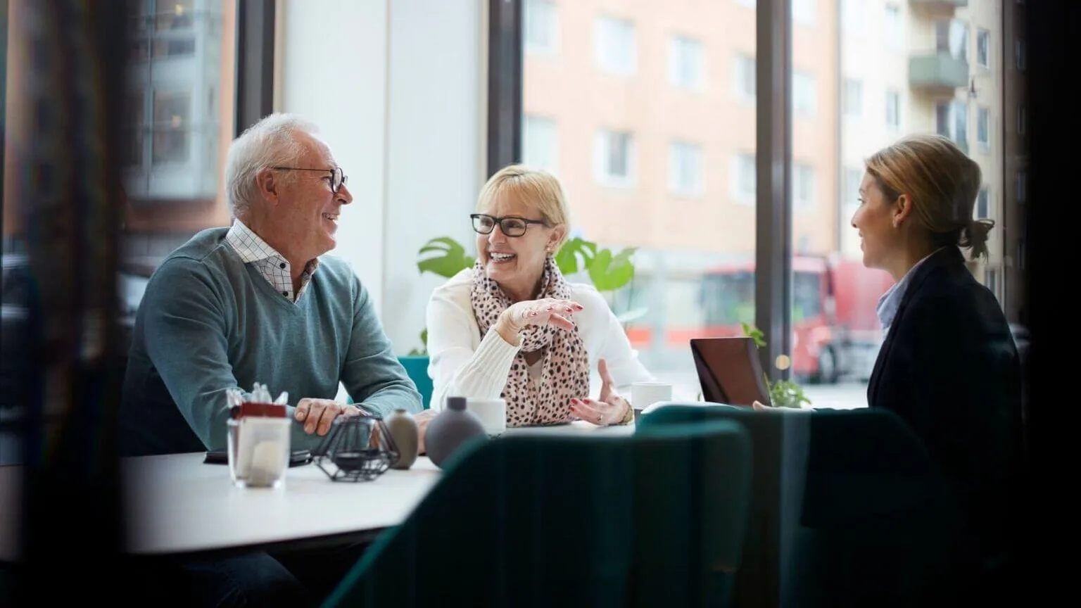 Image: Getty Images Elderly couple considered the best GIC rates in Canada as they look at low risk investments.