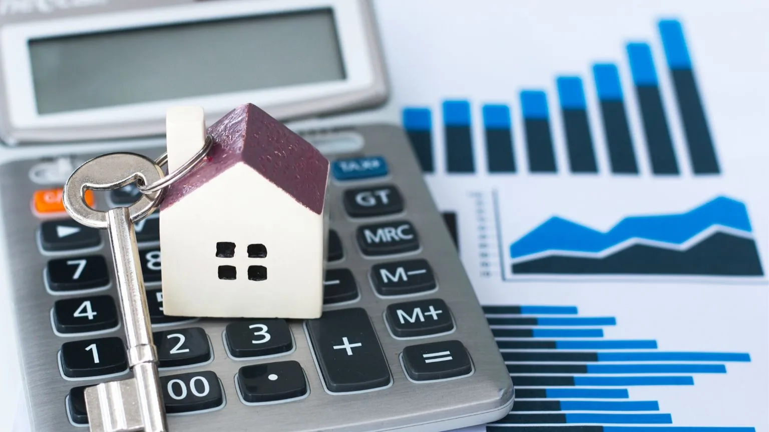 Image: Getty Images Calculating mortgage repayments.