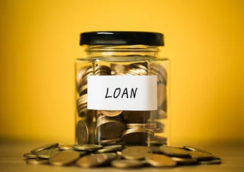 Coin jar with a label that says "Loan"