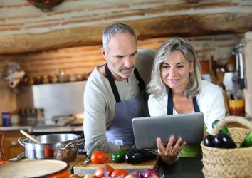 Older couple working in a small business they own