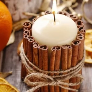 Image: Stephanie Garden Therapy on Etsy Cinnamon sticks glued to candle from Stephanie Garden Therapy on Etsy