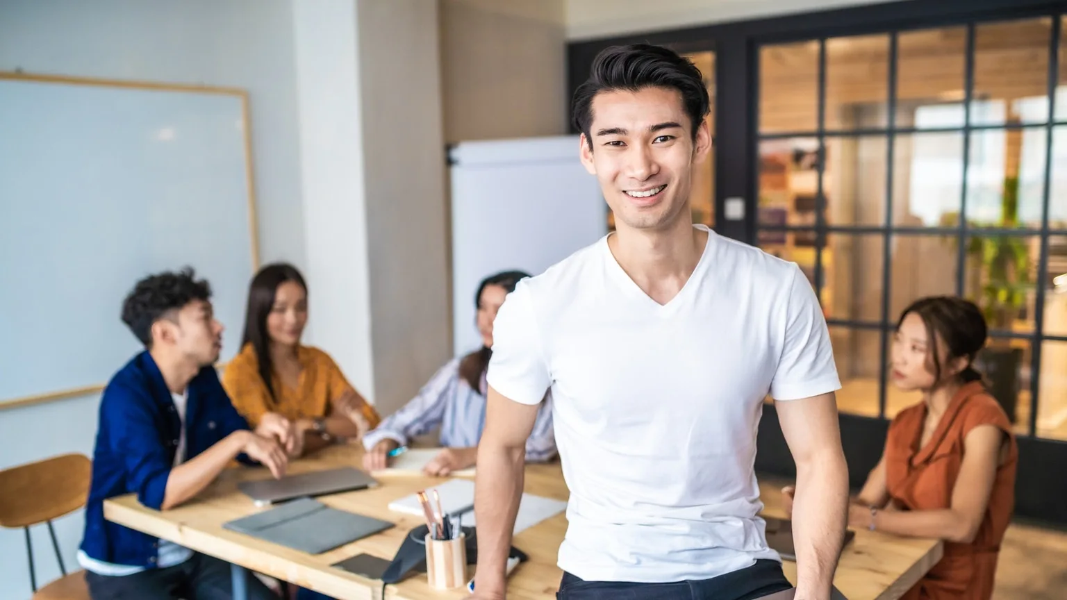 Image: Getty Images Young adult entrepreneur at a business meeting