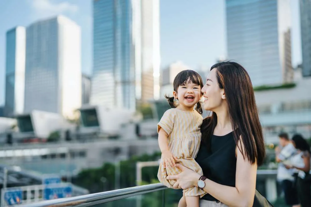 Image: Getty Images woman with daughter in hong kong