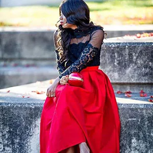 brunette woman in red skirt