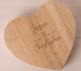 Personalised Heart-Shaped Wooden Cheeseboard - Love Story Couple