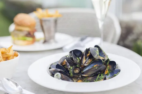 Angelica: City View Two Course Meal with Fizz for Two